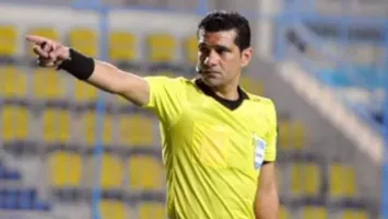 هل تسبب الأهلي في خروج البنا من قائمة الحكام الدولية؟